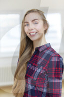 Young Woman wearing a checked Flannel Shirt