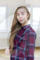 Young Woman wearing a checked Flannel Shirt
