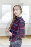 Young Woman wearing a checked Flannel Shirt
