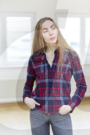 Young Woman wearing a checked Flannel Shirt