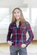 Young Woman wearing a checked Flannel Shirt