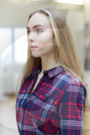 Young Woman wearing a checked Flannel Shirt