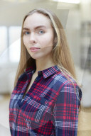 Young Woman wearing a checked Flannel Shirt