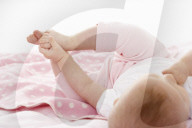 Baby lying on a Blanket