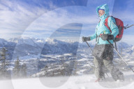 Woman hiking in snowy landscape