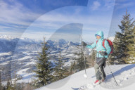 Woman hiking in snowy landscape