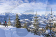 Woman hiking in snowy landscape