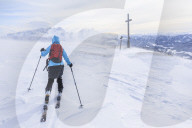 Woman hiking in snowy landscape