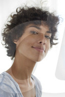 Happy young woman wearing a T-Shirt