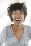 Young woman wearing a T-Shirt laughing