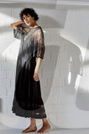 Young Woman wearing a sheer black Dress
