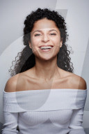 Woman wearing a white off-the-shoulder Top 