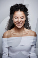 Woman wearing a white off-the-shoulder Top 