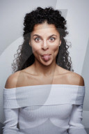 Woman wearing a white off-the-shoulder Top 