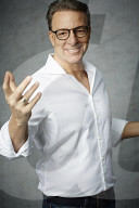 Mature Man wearing a wihte Shirt  
