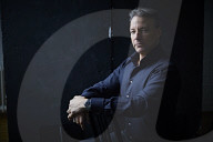 Mature Man sitting  