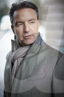 Business Man wearing a grey Coat and Scarf  