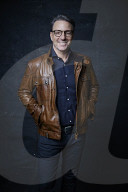 Mature Man wearing a brown Leather Jacket 