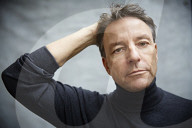 Mature Man wearing a Turtleneck Sweater  