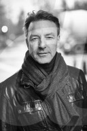 Mature Man wearing a black Leather Jacket  