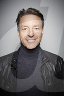 Mature Man wearing a black Leather Jacket  