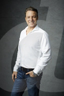 Mature Man wearing a wihte Shirt  