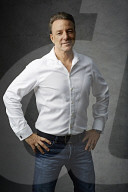 Mature Man wearing a wihte Shirt  