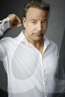 Mature Man wearing a wihte Shirt  