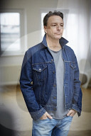 Mature Man wearing a Denim Jacket  