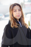 Woman wearing a black Coat 