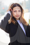 Woman wearing a black Coat 