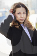 Woman wearing a black Coat 