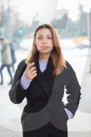 Woman wearing a black Coat 
