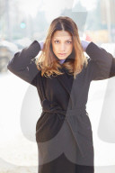  Woman wearing a black Coat 