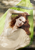 Woman lying relaxed in a Hammock