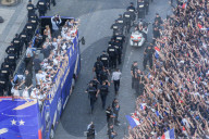 Paris View from the Arc de Triomphe  - Players of the French football team on the Avenue des Champs-Elysees after their victory of the 2018 World Cup in Russia