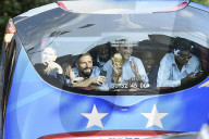 Bus transporting the France's national football team arrives in Paris near the Champs Elysees