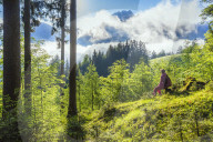 Woman enjoying alpine View in the Morning