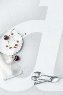 Still Life with Plate, Spoons, Napkin and Cherries