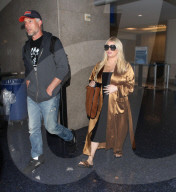 PEOPLE - Schwangere Jessica Simpson landet mit Mann Eric in Los Angeles