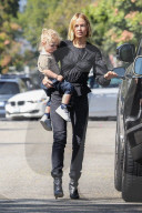 Motherhood keeps Lara Bingle busy!