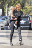 Motherhood keeps Lara Bingle busy!