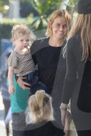 Motherhood keeps Lara Bingle busy!