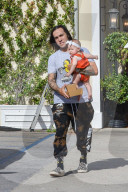 *EXCLUSIVE* Pete Wentz carries daughter Marvel after lunch with the family