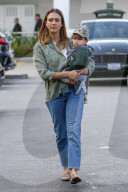 Jessica Alba glows while carrying her son Hayes after going Thanksgiving shopping at Bristol Farms!
