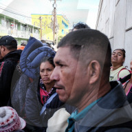 Migrants try to enter the US