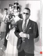 Karl Lagerfeld 1987 Chanel Dress Designer Karl Lagerfeld With Some Of His Creations Exhibited At Sotheby's. Also Portraits In Front Of A Montage....fashion Designer