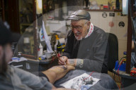 Doc Price is 85 and still working as a tattoo artist