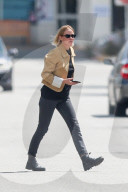 Lara Bingle and Sam Worthington run errands with their kids in Los Angeles.