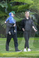 Rosie Huntington-Whiteley and Jason Statham look very much in love as the doting parents step out for an afternoon walk with their son Jack
